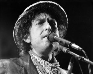 epa05583476 (FILE) A file picture dated 03 June 1984 shows US musician Bob Dylan performing at an open air concert at the Olympic Stadium in Munich, Germany. Dylan won the 2016 Nobel Prize in Literature, the Swedish Academy announced in Stockholm on 13 October 2016. EPA/ISTVAN BAJZAT